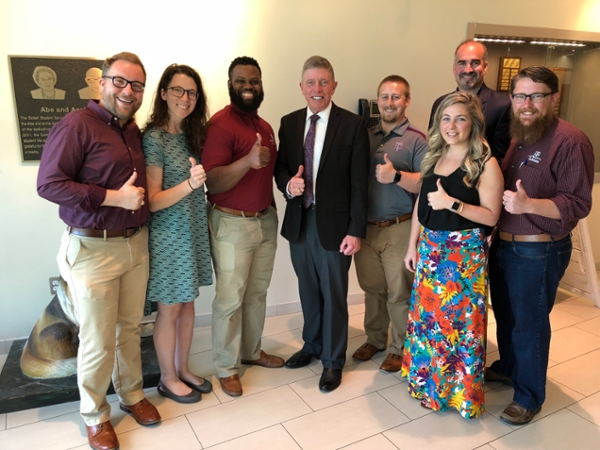 The photo is of the Texas A&M Galveston Hurricane Harvey Evacuation Team with Texas A&M Galveston’s Chief Operating Officer Michael Fossum and Dr. Todd Sutherland, assistant vice president for Student Affairs. 